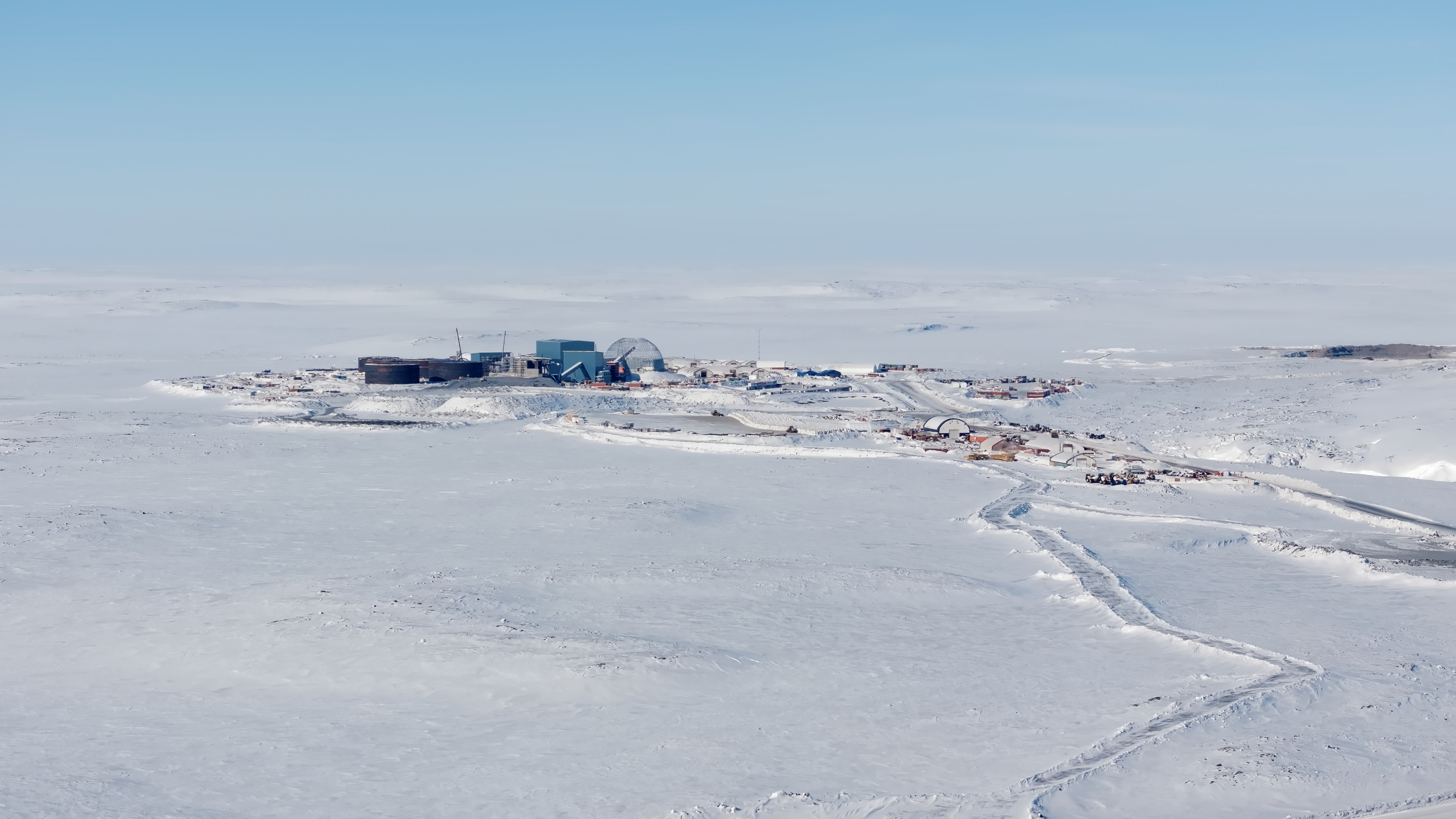 Aerial view of Back River Mine camp site in Nunavut, showing industrial equipment and remote terrain. 
