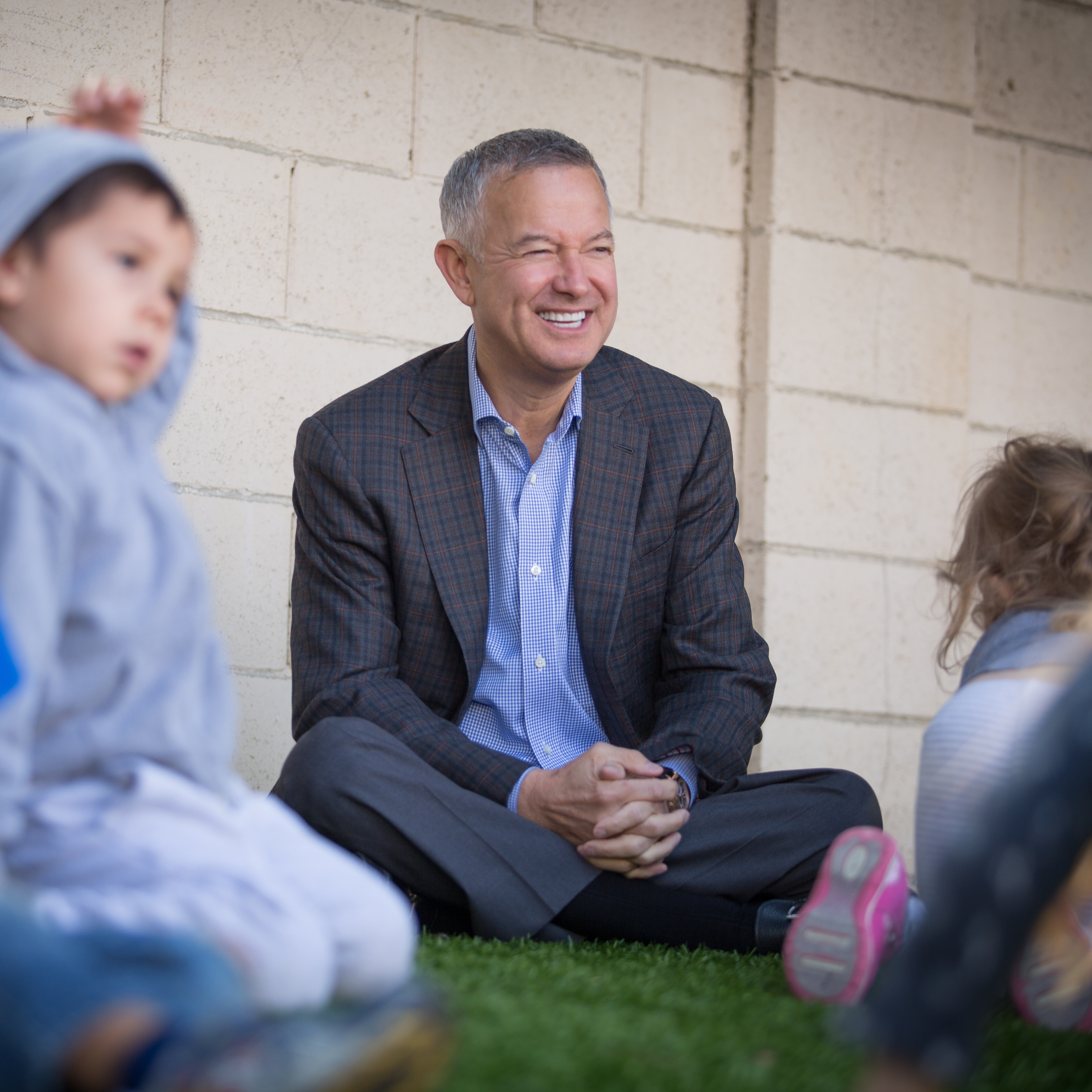 Tom Wyatt speaking with children